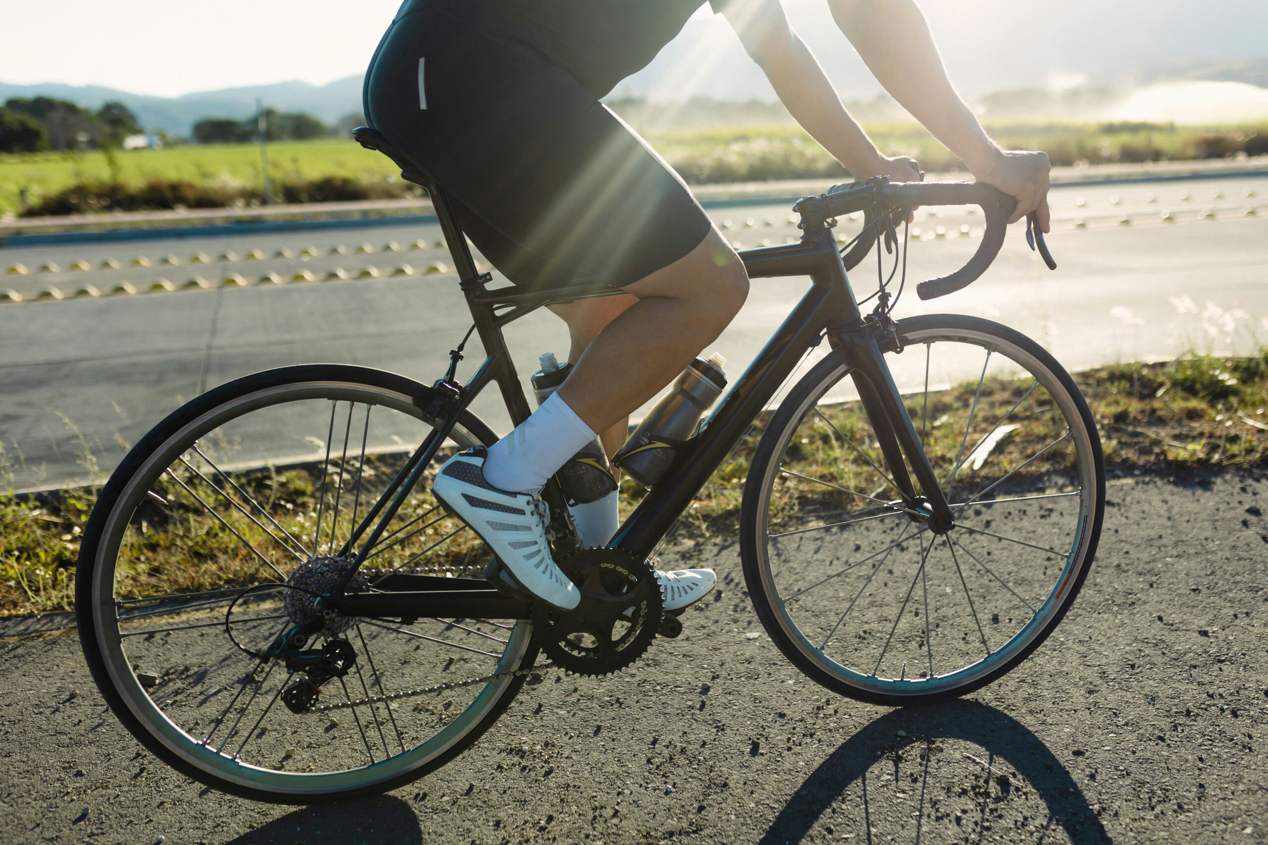 a person riding a bike on the road